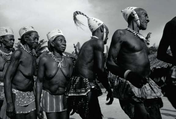 Men and women dancing to celebrate the accession of a member of the fourth rank of 'Bwami'. © Eliot Elisofon Photographic Archives - National Museum of African Art Smithsonian Institution